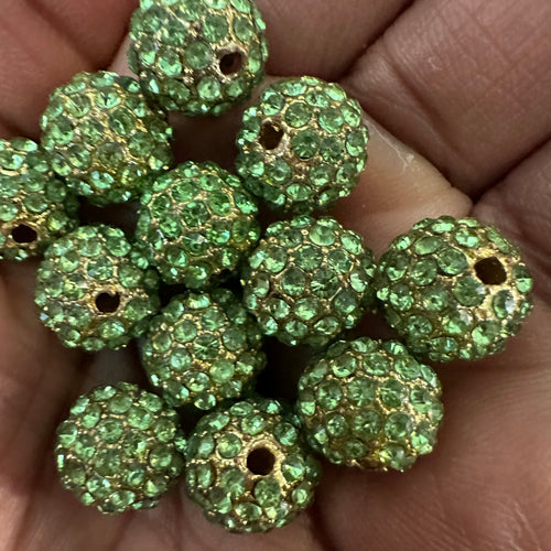 5 green rhinestone beads