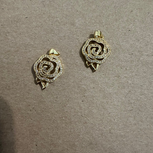 Pave gold rose charms.