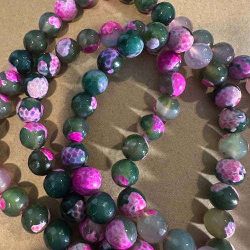 Pink and green beads.