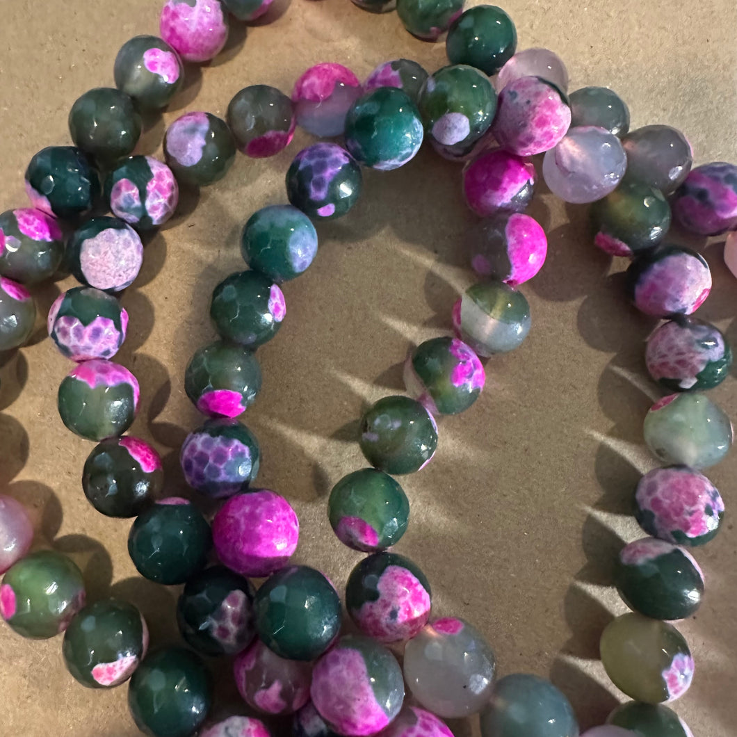 Pink and green beads.