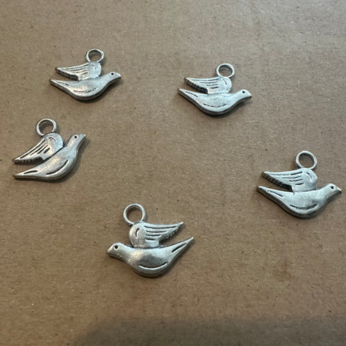 5 dove charms.