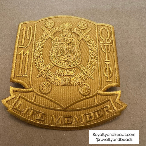 All gold Omega Psi Phi life member patch