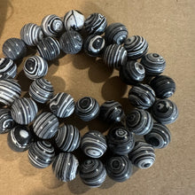 Load image into Gallery viewer, Black and white swirl beads.