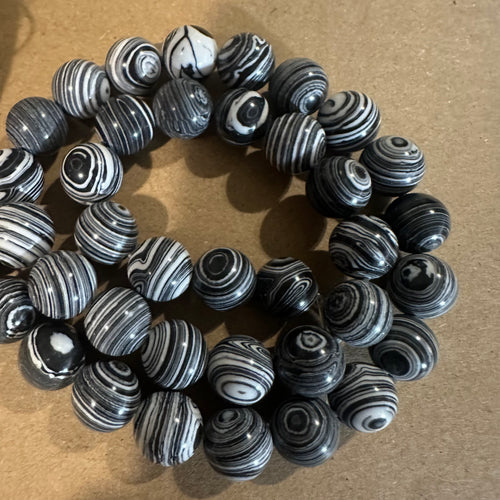Black and white swirl beads.
