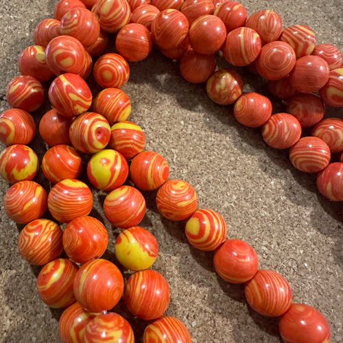 Orange swirl beads.