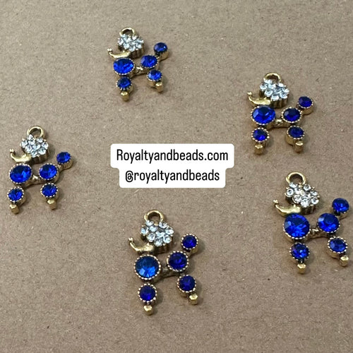 Gold rhinestone poodle charm.