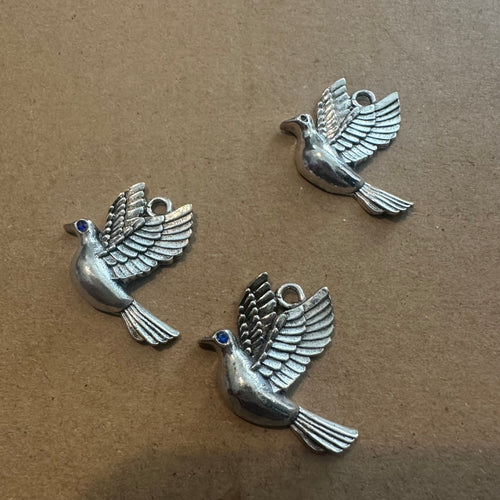 3 dove charms.