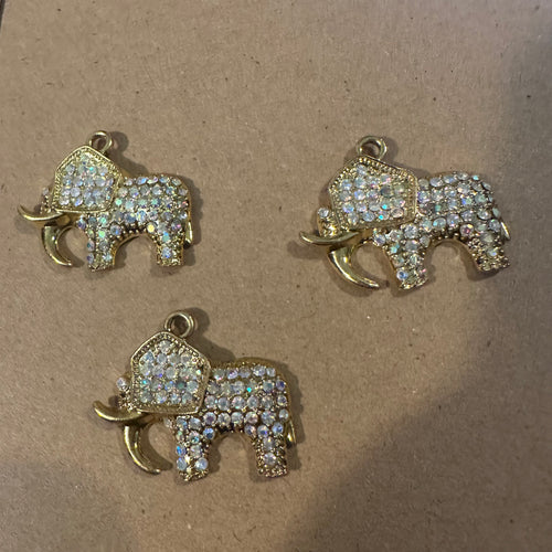 3 gold elephants