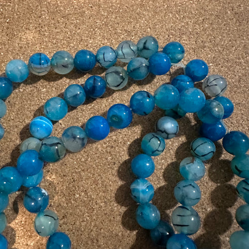 Blue and black agate beads.