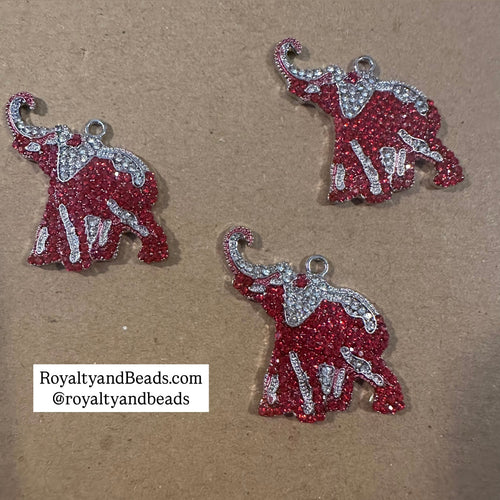 Rhinestone elephant charm.
