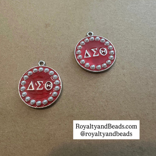 Pearl Delta charms.