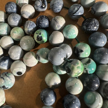Load image into Gallery viewer, Green and black agate beads