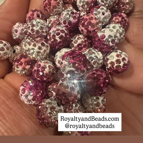 20 pink mixed pave beads.