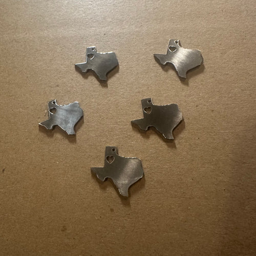 5 silver Texas charms