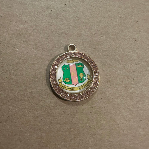 Pink shield circle (gold)