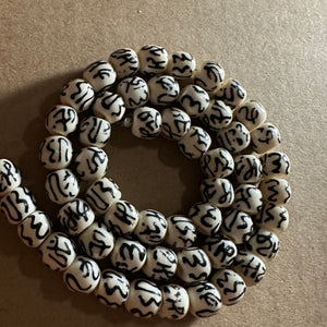 White and black design beads