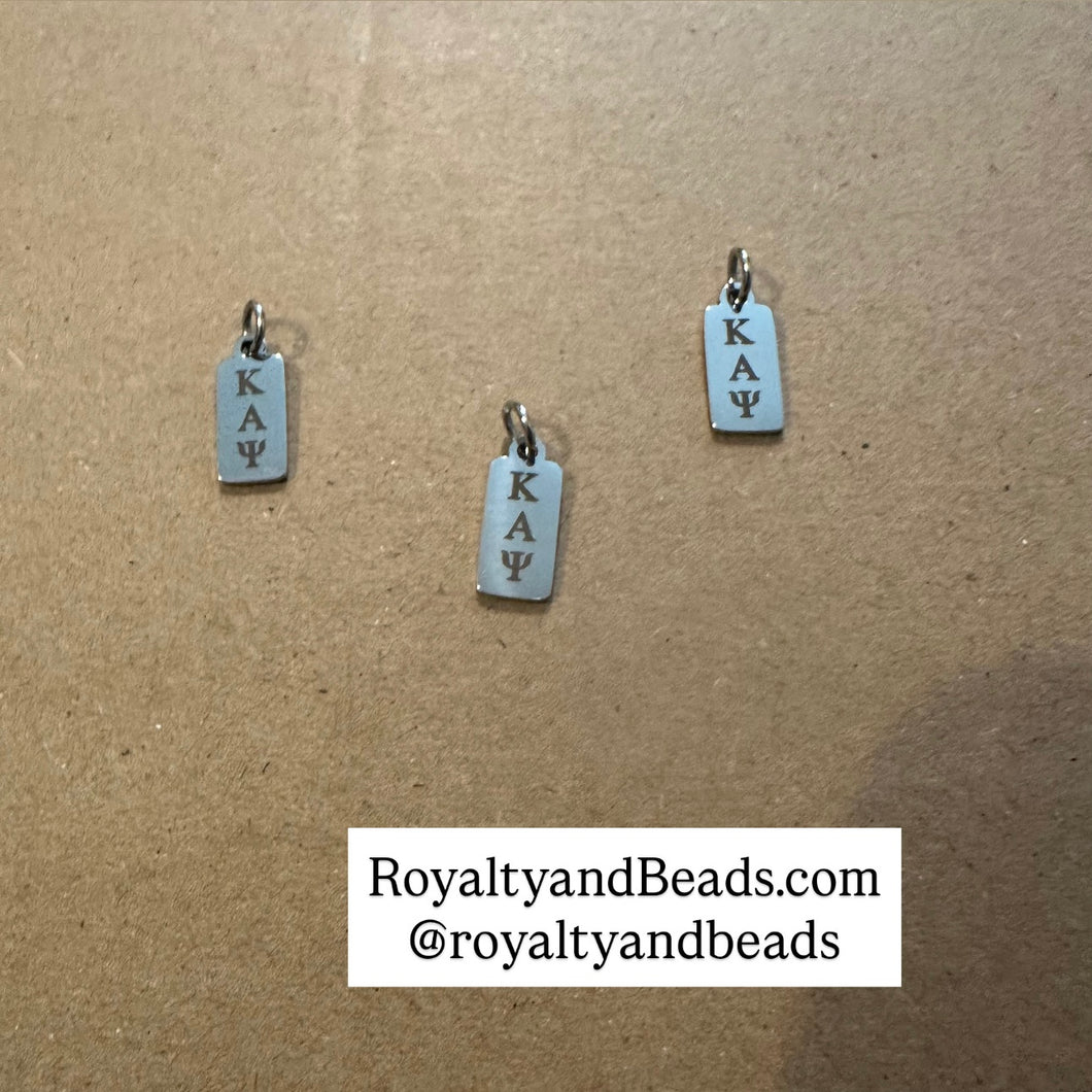 Kappa Alpha Psi tag charm.