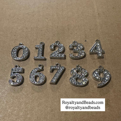 Silver Rhinestone number charm.