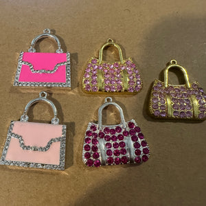 5 pink purse charms