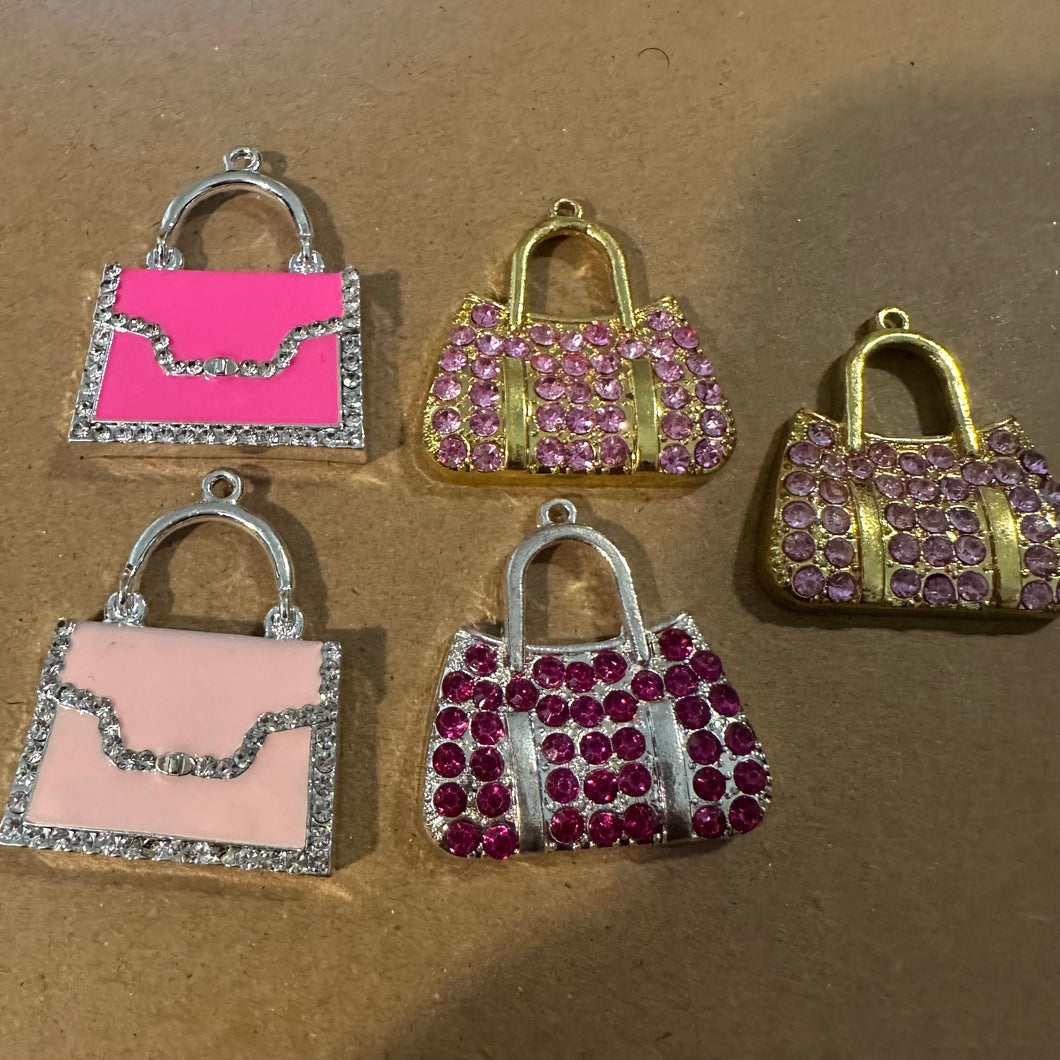 5 pink purse charms