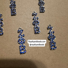 Load image into Gallery viewer, Blue rhinestone Zeta charm.