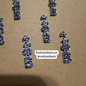 Blue rhinestone Zeta charm.