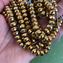 Load image into Gallery viewer, Gold spacer hematite beads.