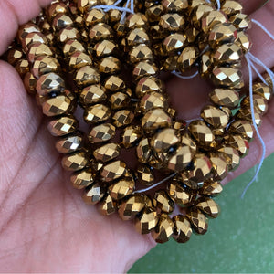 Gold spacer hematite beads.