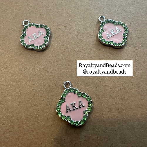 The pink AKA charm