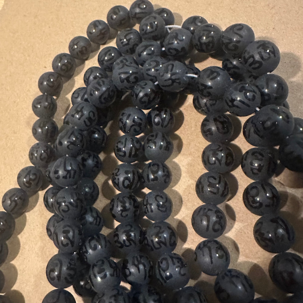 Black patterned beads