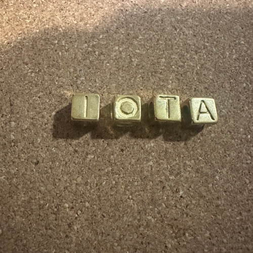 Gold IOTA letters.