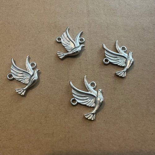 4 dove charms.