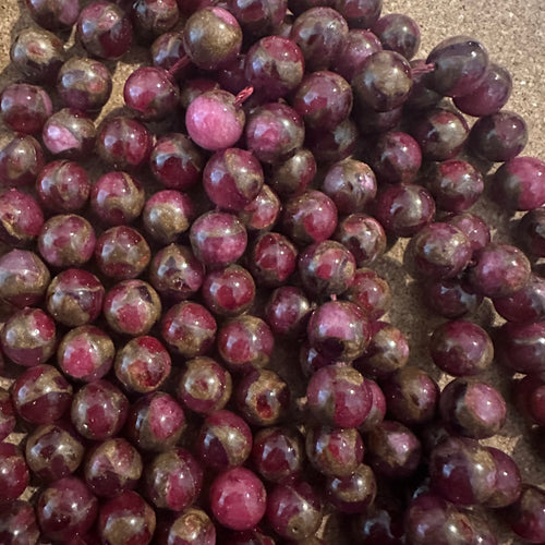 Pink and gold beads.