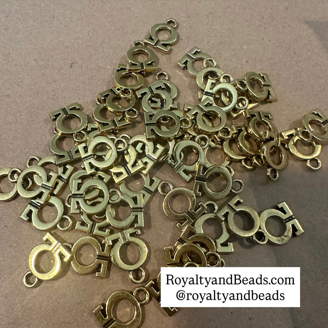 Omega charms.