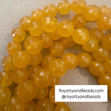 Load image into Gallery viewer, Faceted yellow beads 12mm