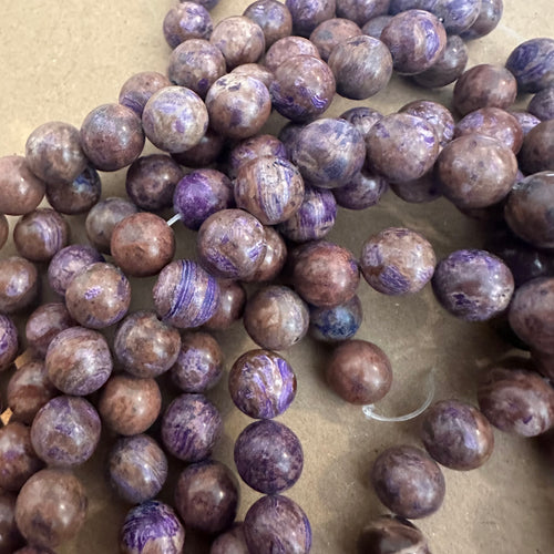 Purple Jasper beads.