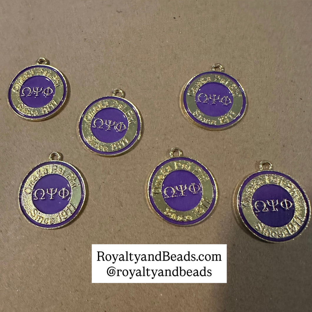 Big circle Omega charm.