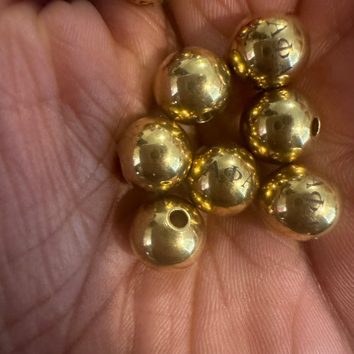 Stainless Alpha beads.