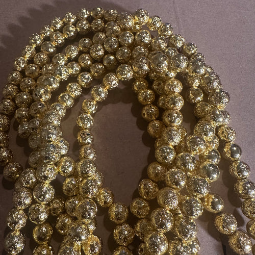 Gold rock beads. 8mm