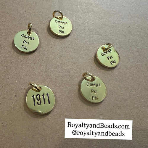 Omega Frat circle charms.