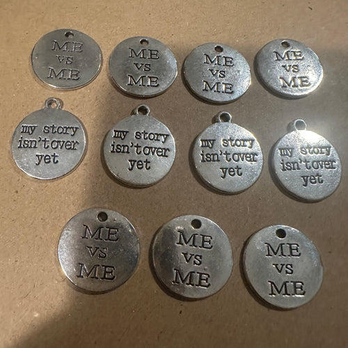 11 silver charms