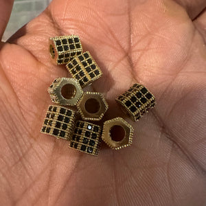 3 pave black and gold spacers