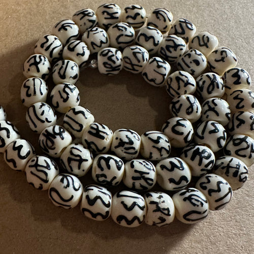 White and black design beads