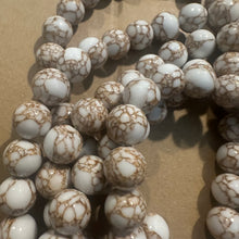 Load image into Gallery viewer, White and gold beads