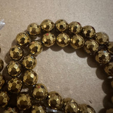 Load image into Gallery viewer, Gold hematite 8mm. (Faceted)