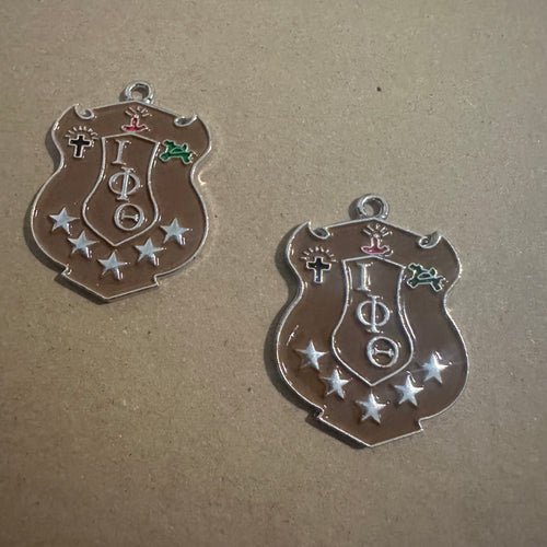 Iota Phi Theta charm.