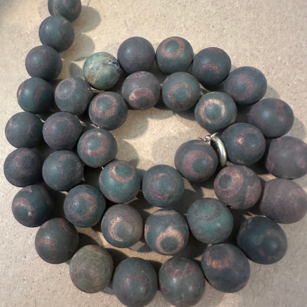 Brown and green circle camo beads