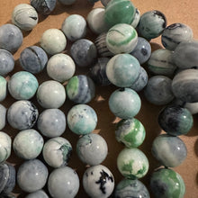 Load image into Gallery viewer, Greenish agate beads.