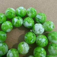 Load image into Gallery viewer, Green and white beads.