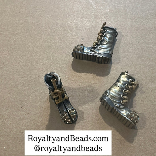 Bronze boot charms.